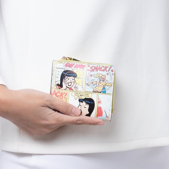 kate spade Handbags - Kate Spade Archie Comics Small L Zip Bifold Wallet